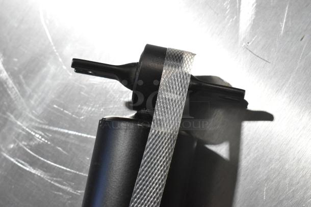 2 brand new KYB 344403 Excel G gas shock absorbers, showing minor scratch and dent, condition suggests unused.