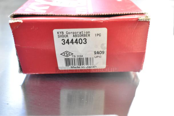 Boxed KYB 344403 Excel G Shock Absorber, "Made in Japan" label, new condition with minor box wear.