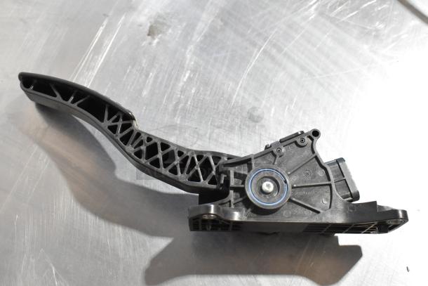 Set of four automotive components, including a Grand Sport pedal assembly, shown in black plastic with detailed framework.