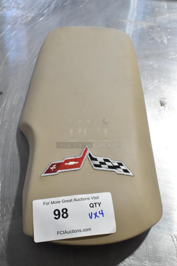 Cream Grand Sport pad featuring embroidered logo; auction tag indicates quantity 4, item number 98.