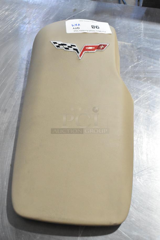 Beige Grand Sport pad with embroidered logo, excellent condition, includes 4 items per bid. Auction label "Lot 98, Qty 4x1".