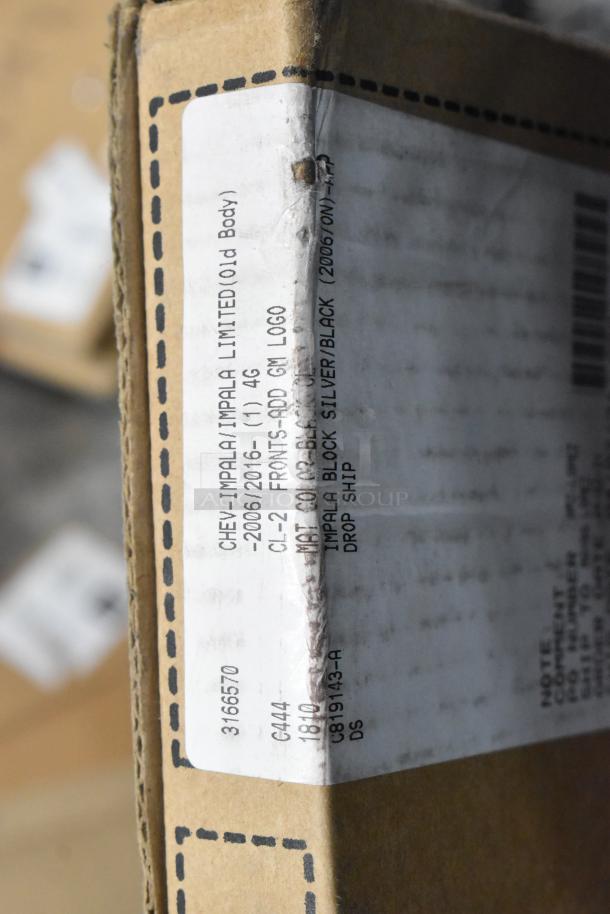 Cardboard box labeled for Chevy Impala/Impala Limited car mats, indicating front set with GM logo, potential scratch and dent condition.
