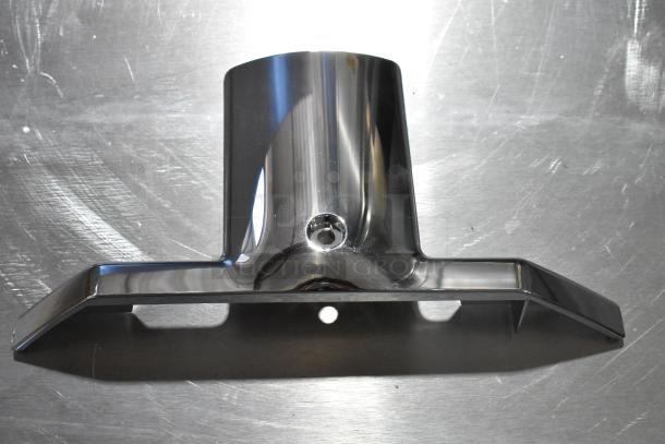 Chrome-finished GM metal part, sleek design with mounting holes, excellent condition, ideal for automotive use.