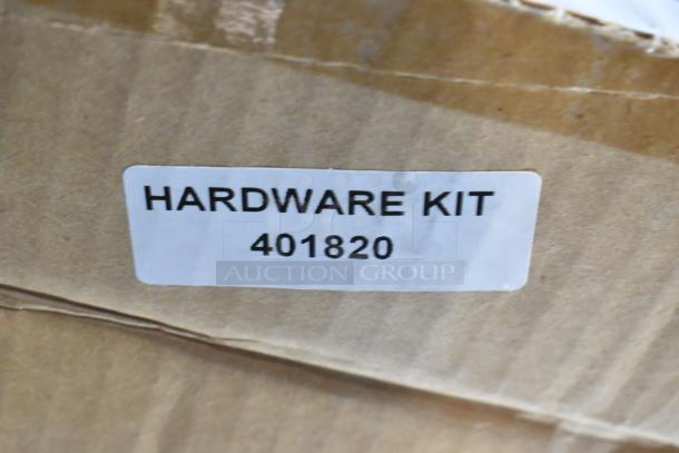 Cardboard box labeled "Hardware Kit 401820," part of auction item set including GM metal part.