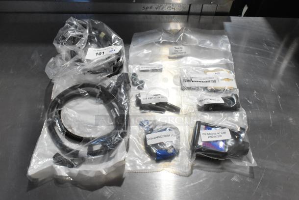 Three items including oil additive, oil seal, and gear kit. New condition with labeled packaging showing part numbers.