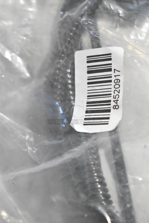 Plastic-wrapped item featuring visible bar code 84520917; includes oil additive, oil seal, and gear kit. Auction item.