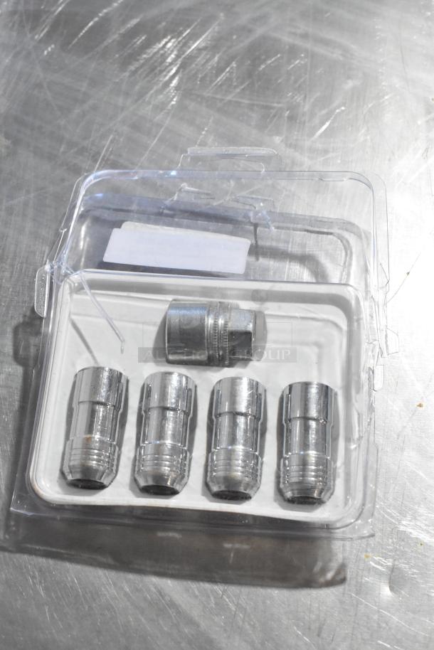 Clear plastic packaging displaying four metal hubcap bolt sets, new condition, arranged in a row.