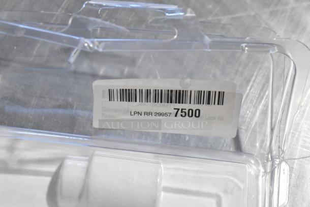 Clear plastic packaging with a barcode label, number 7500, labeled "Genuine GM, New, Wheel Lock Kit."