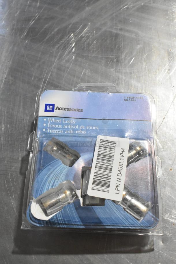 GM Accessories wheel locks package, includes four chrome bolt sets. Features multilingual labeling and barcode. Item #19211912.