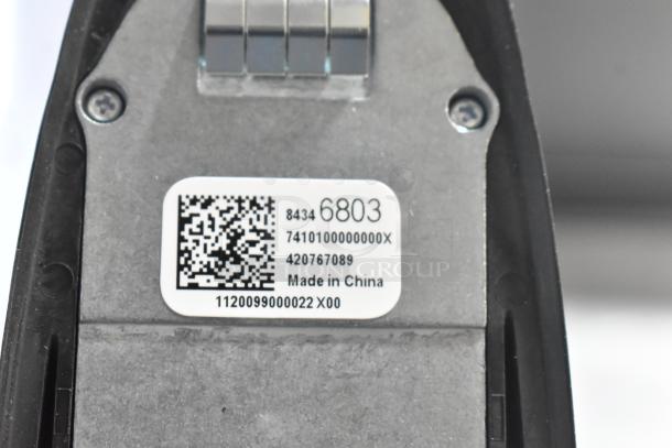 Close-up of a vent with a label showing model 6803, Made in China, with numeric codes and a QR code.