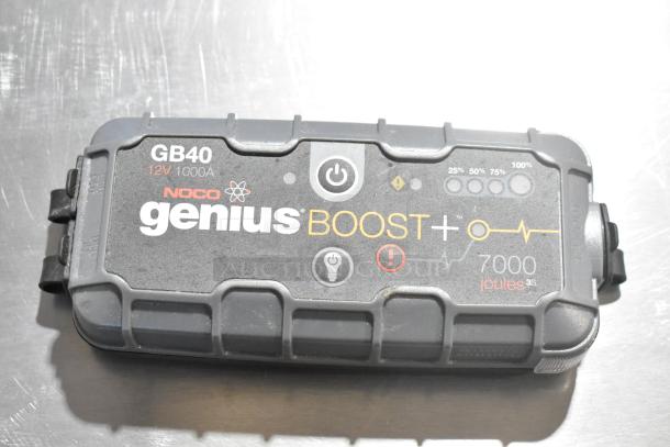 NOCO GB40 Genius Boost 12V 1000A jump starter, black, shows battery status indicators and branding on label, in good condition.