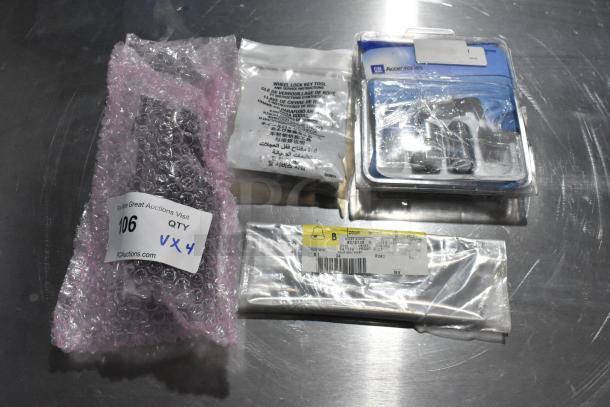 4 items including GM wheel locks, A/C and heat panel, packaged and labeled in bags on a metal surface.