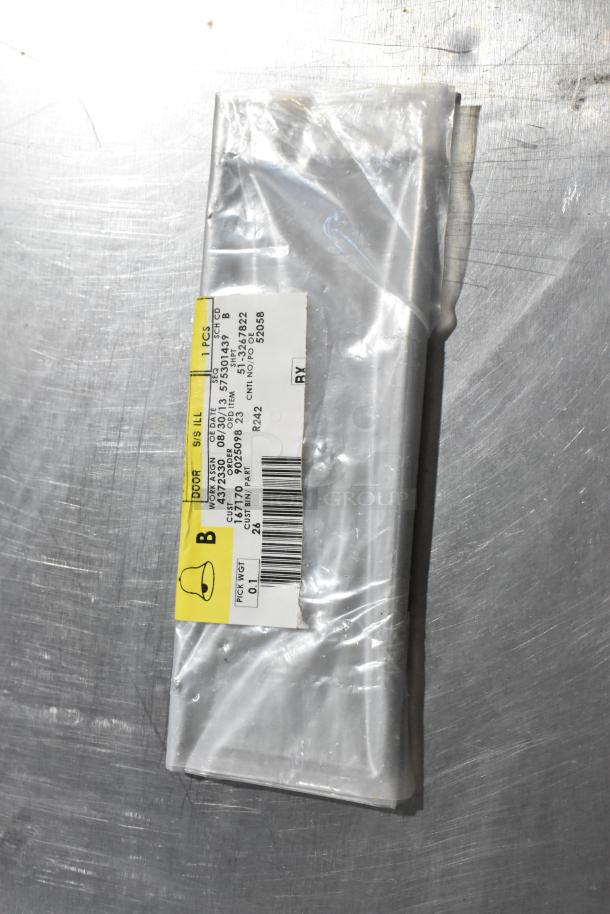 Sealed plastic package with GM wheel locks and A/C heat panel, labeled with product codes and shipping information.