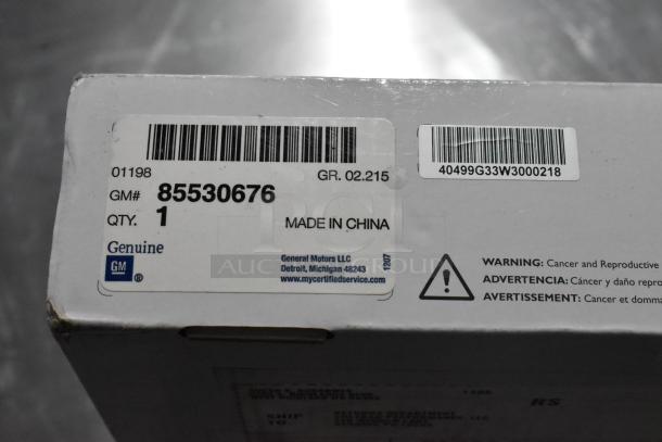 GM 85530676 Battery Tender box for C6-C8 Corvettes; genuine GM accessory, made in China, includes warning label.