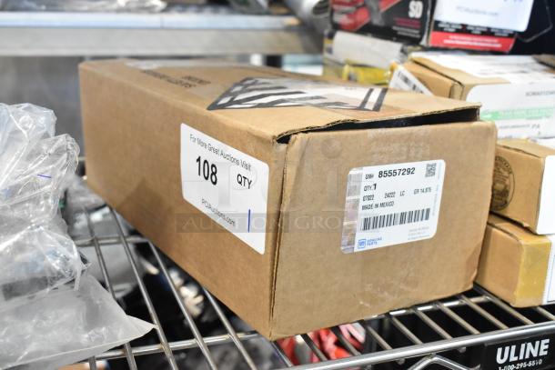 Boxed GM 85557292 yellow seat belt, new condition, labeled "Made in Mexico," quantity 1.