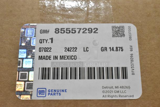 GM 85557292 yellow seat belt, Made in Mexico, GM Genuine Parts label visible, new condition, part number tagged.