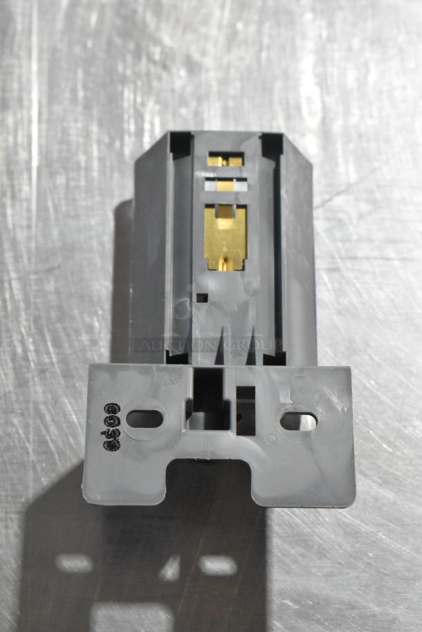 Four automotive parts including X34-122-B1 module, GM 25664746, Corvette LT1 piece, GM brake light part; bid includes all.