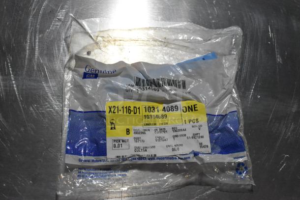 Plastic packaging for GM part X21-116-D1, labeled as emblem F/DR, 1 piece, showing barcodes and product details.