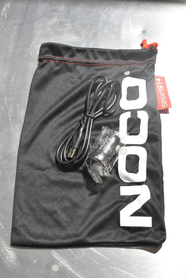 Noco GB40 Genius Boost with cables, packaged on branded pouch, excellent condition, for auction.