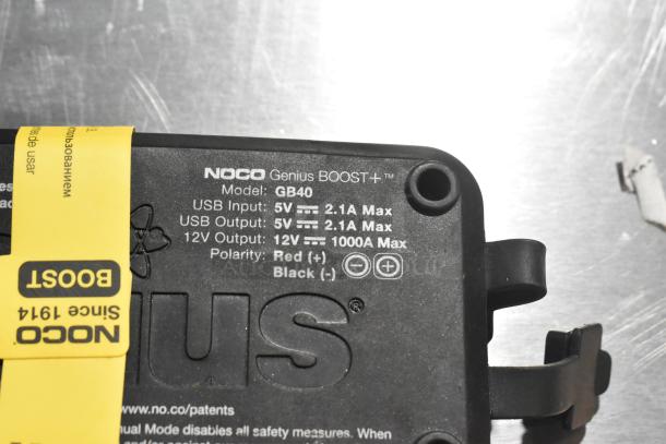 Noco GB40 Genius Boost in good condition, showing model and output specs on label.