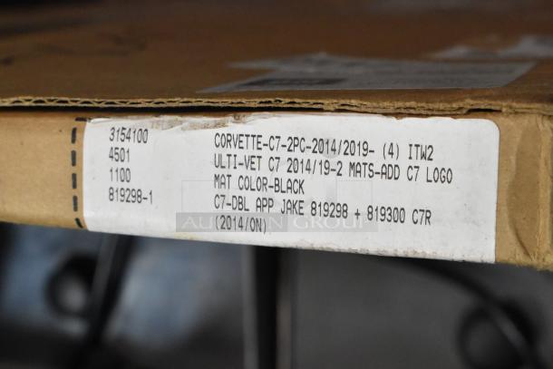 Cardboard box label showing Corvette C7 floor mats details, black color, fits 2014-2019 models, brand new.