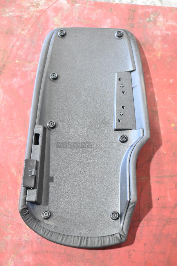 Camaro car pad in good condition, featuring a smooth black finish with visible mounting screws and locking mechanism.