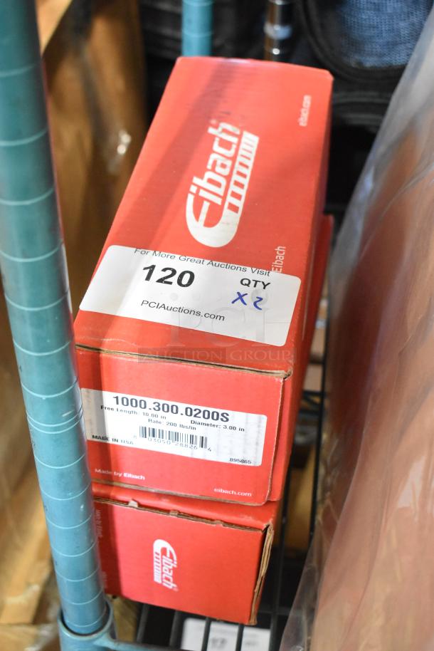Eibach Coil Box 1000.300.0200S, red with label indicating free length 10 in, diameter 3 in, rate 200 lbs/in. Quantity 2.
