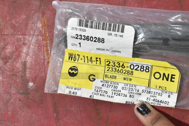 GM 23360288 wiper blade in original packaging, labeled "Made in Japan," includes product and shipping details.