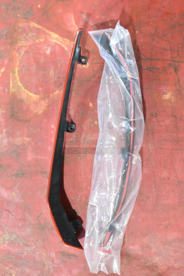 Set of four items including GM 23360288 wiper blade, wrapped in plastic. Appears new, offers bid increase opportunity.
