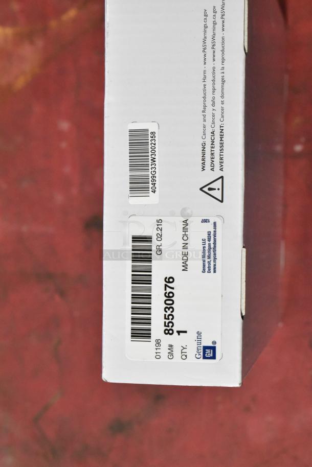 GM 85530676 Battery Tender box for C6, C7, C8 Corvettes, GM Genuine Accessories label, Made in China.