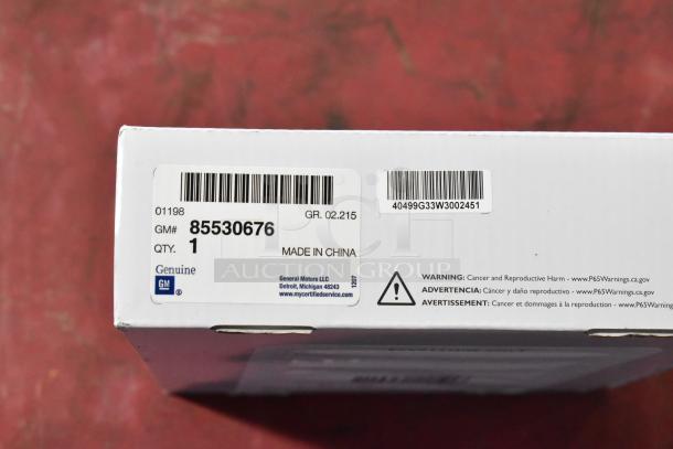 GM 85530676 Battery Tender for C6-C8 Corvettes, new in box, includes warning label for cancer and reproductive harm.