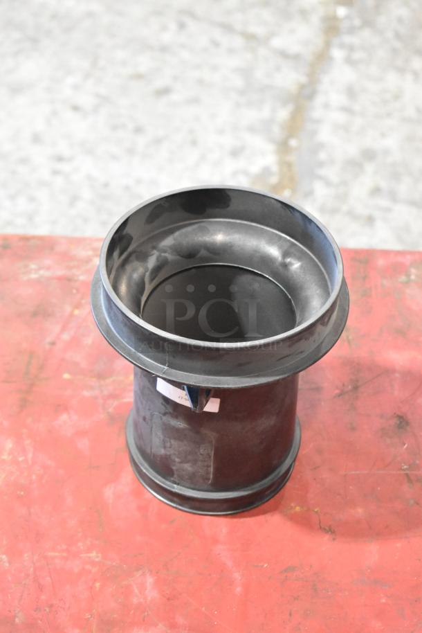 Metal cylindrical part, likely part of the 4-piece lot, with a visible paper tag. Potentially includes a 997-951F filter.