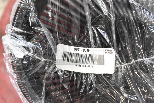 997-951F filter wrapped in plastic, labeled "Made in the U.S.A." with barcode and date 6/28/2016. Auction for four items.