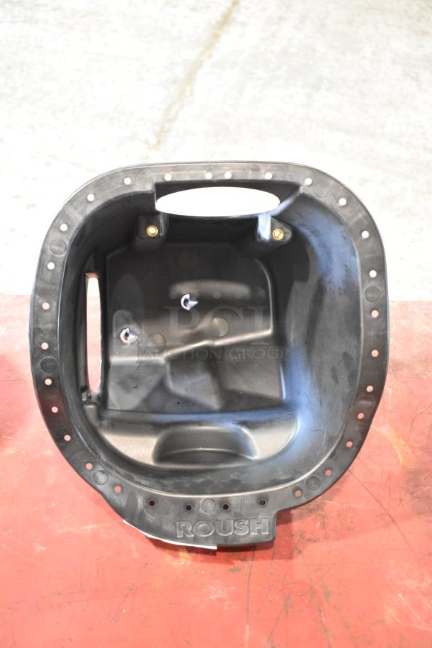Roush black metal part with bolt holes, visible in the center. Suitable for automotive use, excellent condition.
