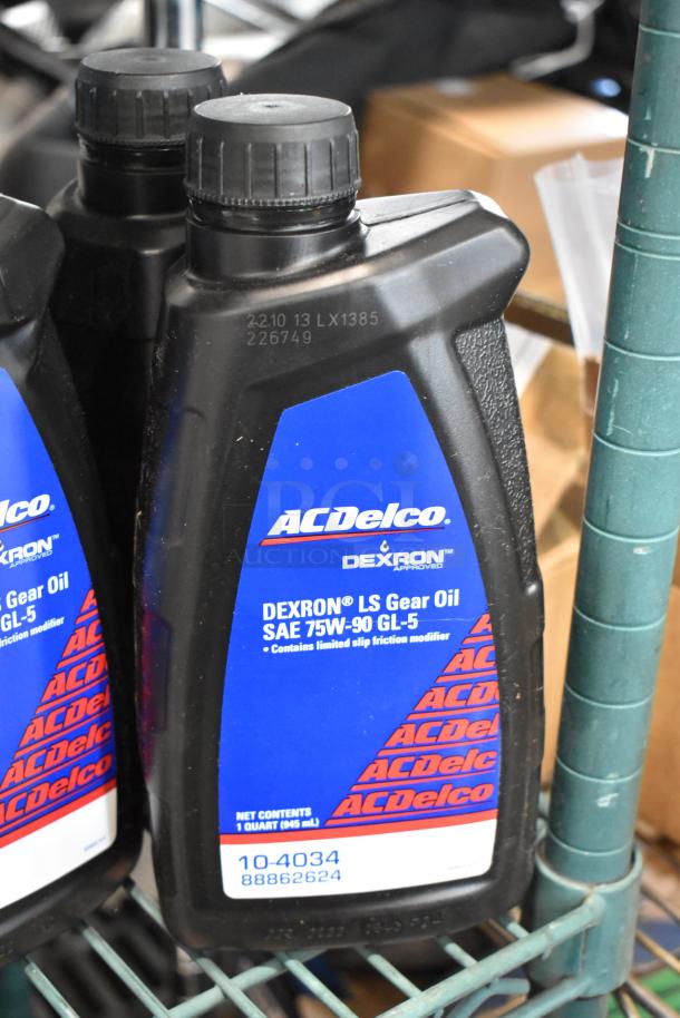ACDelco DEXRON LS Gear Oil bottles, SAE 75W-90 GL-5, 1 quart each, new condition, includes eight items per bid.