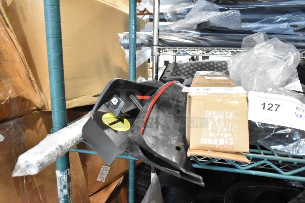 Six assorted items including Z71 Off Road emblems, packaging visible, various conditions, lot number 127.