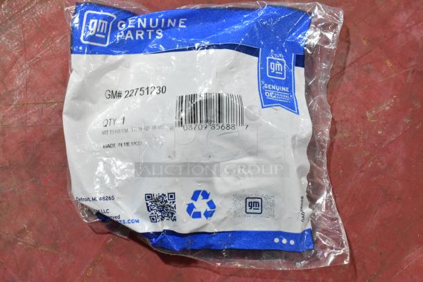 GM 22751230 Door Latch Release Switch in sealed packaging. Genuine GM Parts, made in Mexico. Includes barcode and labels.