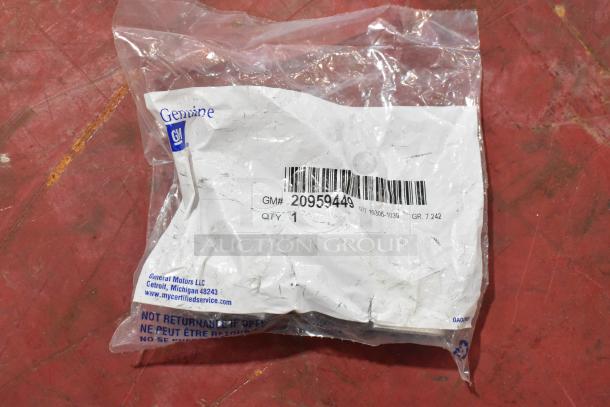 7 GM items including GM 20959449 stabilizer shaft clamp in plastic packaging with visible label, new condition.