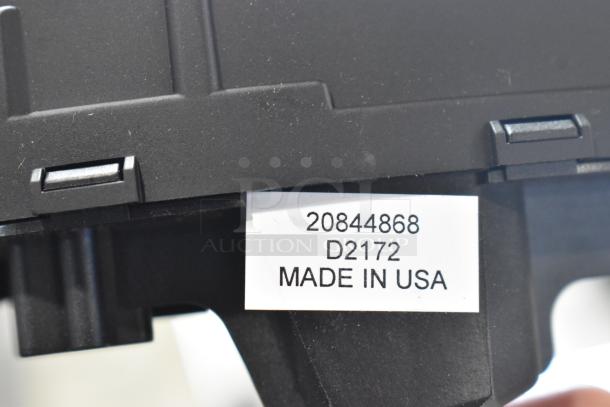 GM 20844868 switch with label "D2172, Made in USA," in excellent condition. Part of auction with Curt Triflex.