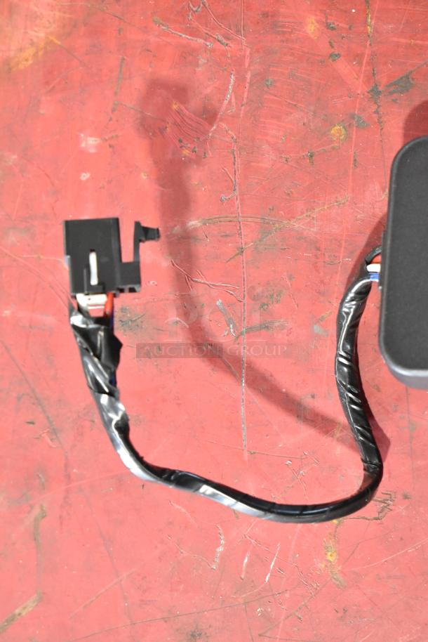 Alt text: GM 20844868 switch with wiring on red background. Item in used condition.