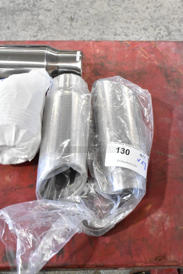 Stainless steel exhaust pieces, wrapped in plastic. Includes a quantity label marked "130, Qty 8, PCIAuctions.com."