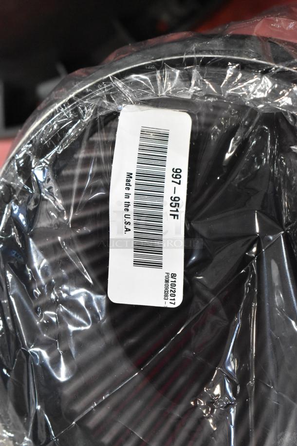 Box of parts with visible black filter, labeled "997-951F," "Made in the USA," dated 8/10/2017, wrapped in plastic.