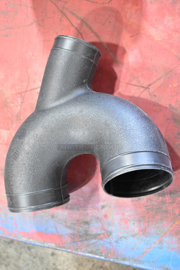 Black rubber Y-shaped tube, textured surface, labels indicate part number 109795205A, made in USA, good condition.