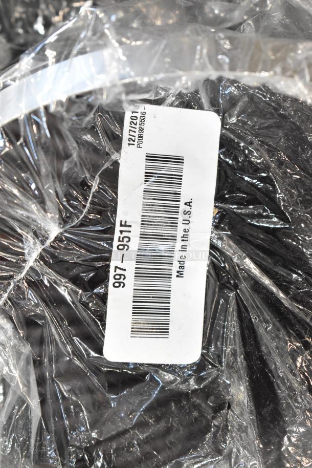 Box of parts in plastic wrap with visible label displaying "997-951F, Made in the U.S.A." Includes a filter.