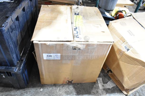 Cardboard box labeled "139," contains a cold air intake kit and assorted parts. Box shows wear, sealed with tape.