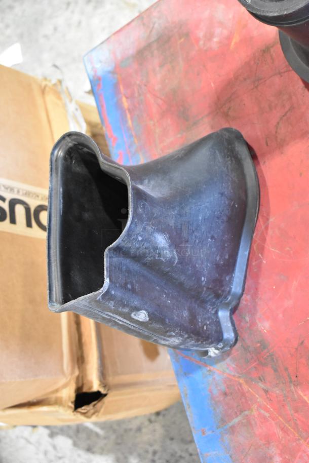 Box of parts with 131550-CAKHK-AB cold air intake kit piece, used condition, visible wear on plastic component.