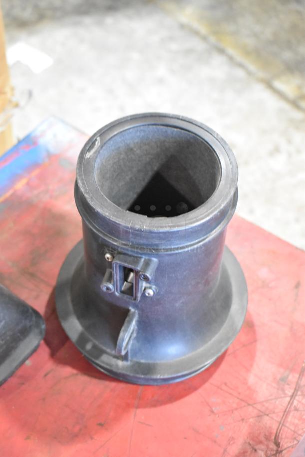 Box containing 131550-CAKHK-AB cold air intake kit part, black cylindrical component, good condition, on red surface.