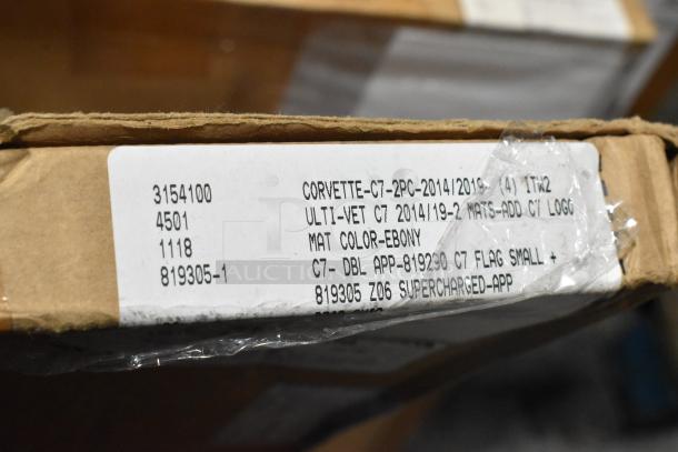 Box label with product details for Corvette C7 mats, ebony color, 2014-2019 models, includes C7 logo.