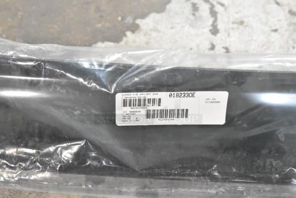 Plastic-wrapped car floor mat, model 0182330E, for Chevy Savanna. Label indicates "Made in USA", part ID 3999284.