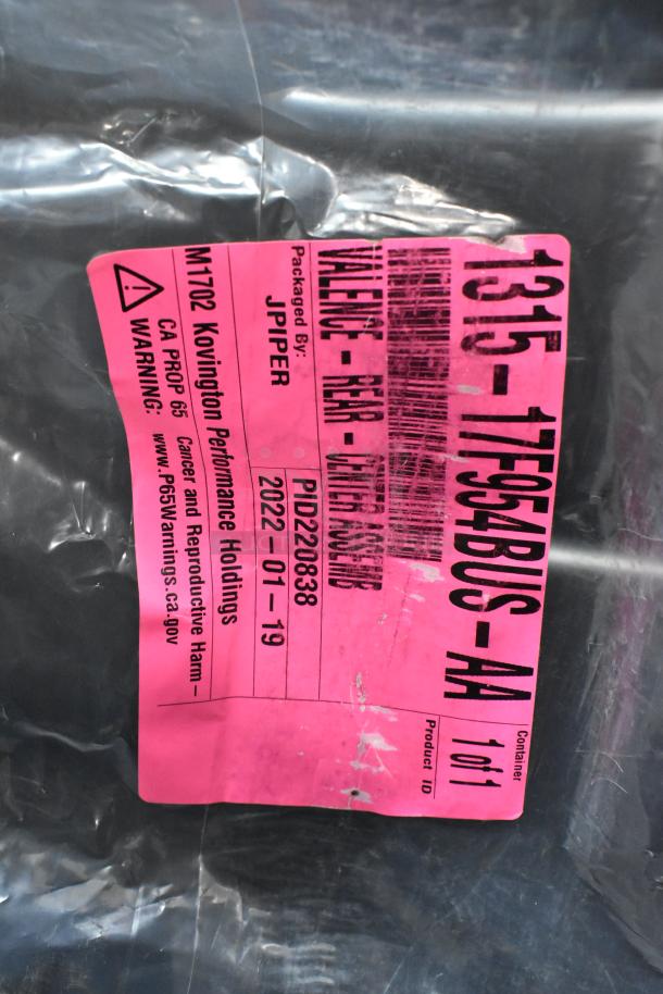 Pink label on packaging, item: valence rear center assembly. Packaged by JPIPER. Date: 2022-01-19. Product ID: PID220838.